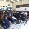Evento presencial en la Fiscalía General del Estado de Michoacán con ponente explicando odontología forense ante personal institucional