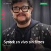 Aleks Syntek en una transmisión en vivo, con micrófono y expresión intensa, fondo difuminado, relacionado con la polémica