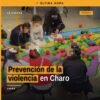 Personal de la Fiscalía General del Estado de Michoacán interactuando con niñas, niños y adolescentes en un stand lúdico