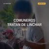 comuneros tratan linchar: dos hombres amarrados a un poste en la plaza de San Lorenzo, Uruapan, rodeados por personas y