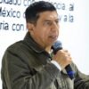desaparición ayuntamiento juchitán: edificio municipal con bandera estatal y símbolos de autoridad