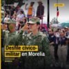 Desfile cívico-militar en marcha por la avenida Madero, Centro Histórico de Morelia, con participantes en uniforme y