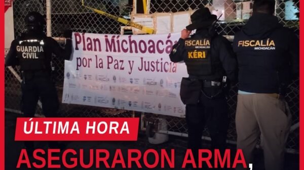 cateos en lotes de vehículos: agentes de la FGE y SIE en operativo en un lote de autos en Morelia, Michoacán
