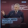 Escenario festivo con bandera mexicana y arcos detectores en Morelia durante los festejos patrios michoacán