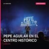 Pepe Aguilar actuando en vivo en el centro histórico, con bandera mexicana y trompeta, ambiente festivo y público