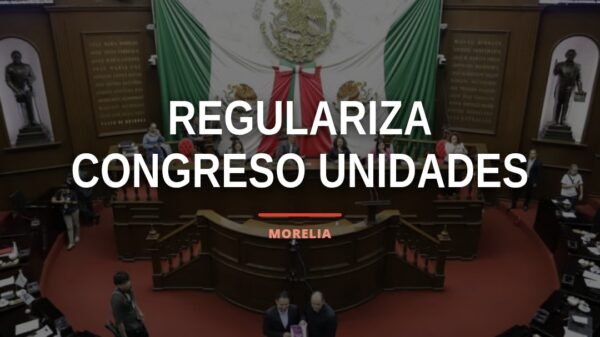 Fachada del Congreso del Estado de Michoacán en Morelia con bandera estatal, representando la reforma que regulariza