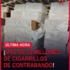Contenedor abierto con cajas de cartón etiquetadas como cigarrillos de contrabando en el puerto de Lázaro Cárdenas, Michoacán
