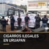 Dos hombres detenidos por la SSP en Uruapan con mochila que contiene cajetillas de cigarros ilegales