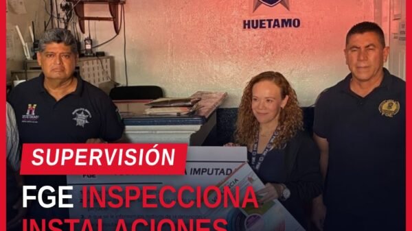 Autoridades de la Fiscalía General del Estado de Michoacán y de Seguridad Pública Municipal de Huetamo durante la visita de