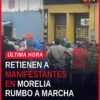 retención de manifestantes: grupo de personas detenidas por policías en la avenida La Huerta, Morelia, frente al panteón