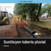 Obreros instalando tubería pluvial de gran diámetro en una calle del poniente de Morelia, con equipo pesado y señalización
